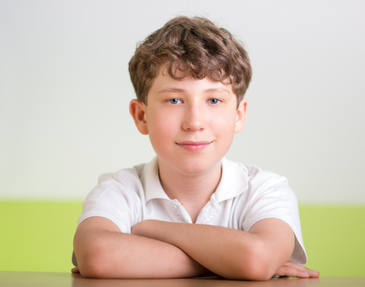Food for Thought Therapy | A Personal Story One Individual’s Success with ARFID using Hypnosis with Kelly | Color image of boy with arms crossed on table