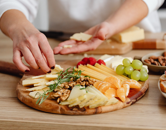 Food for Thought Therapy | When Picky Meets Trendy | Person taking cheese off a charcuterie board